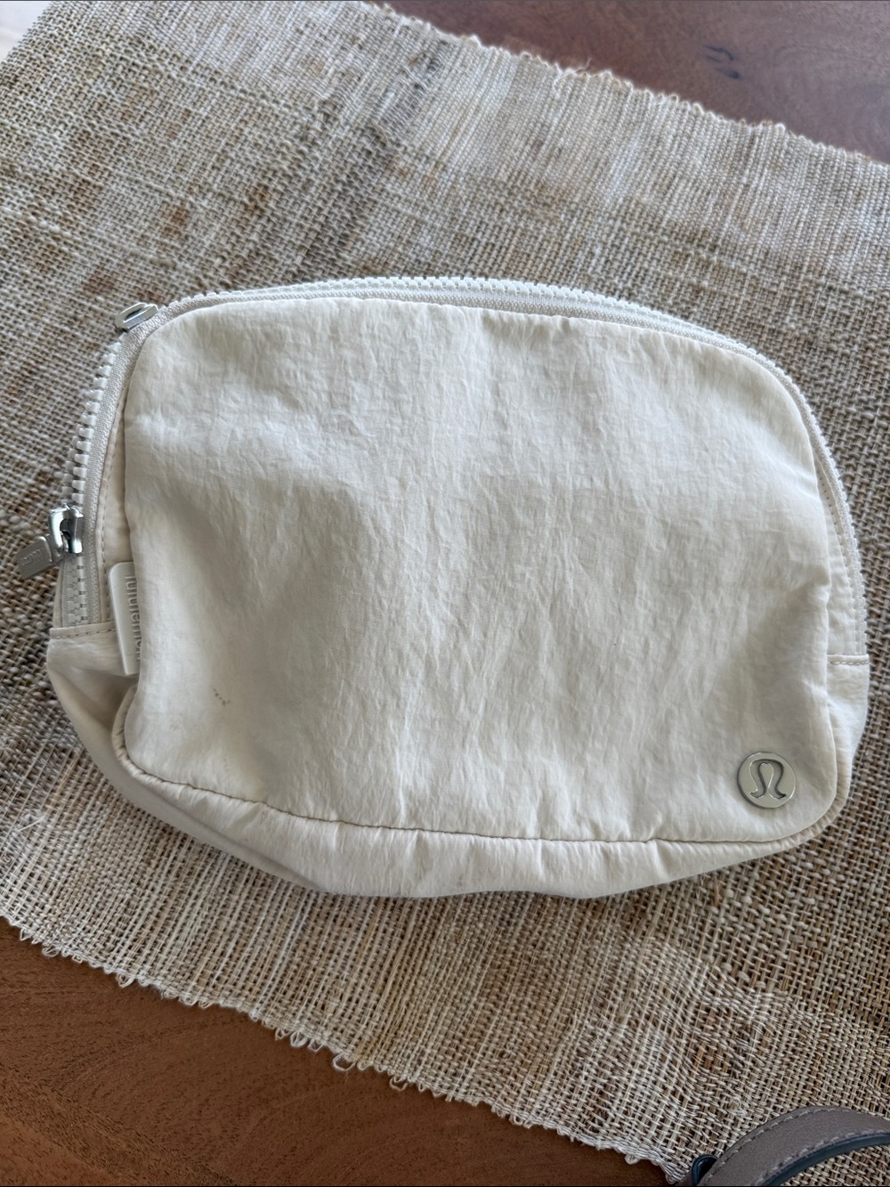 Lululemon Cream Women’s crossbody bag.